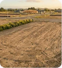 Cleared plot and surrounding development